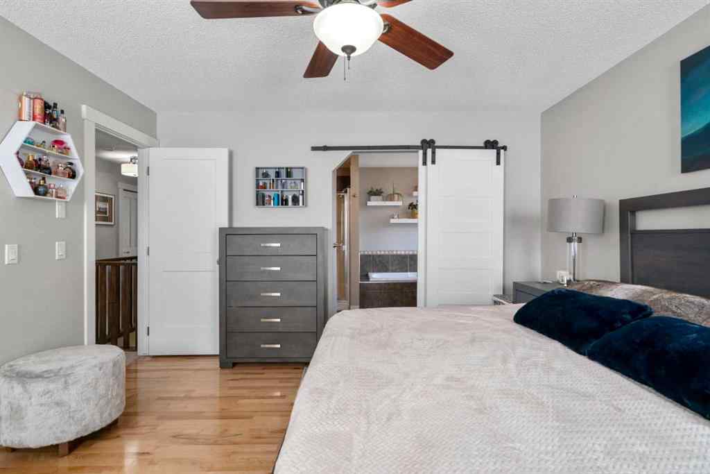 MLS® A2266136 - 2581 Coopers Circle SW in Coopers Crossing Airdrie, Residential