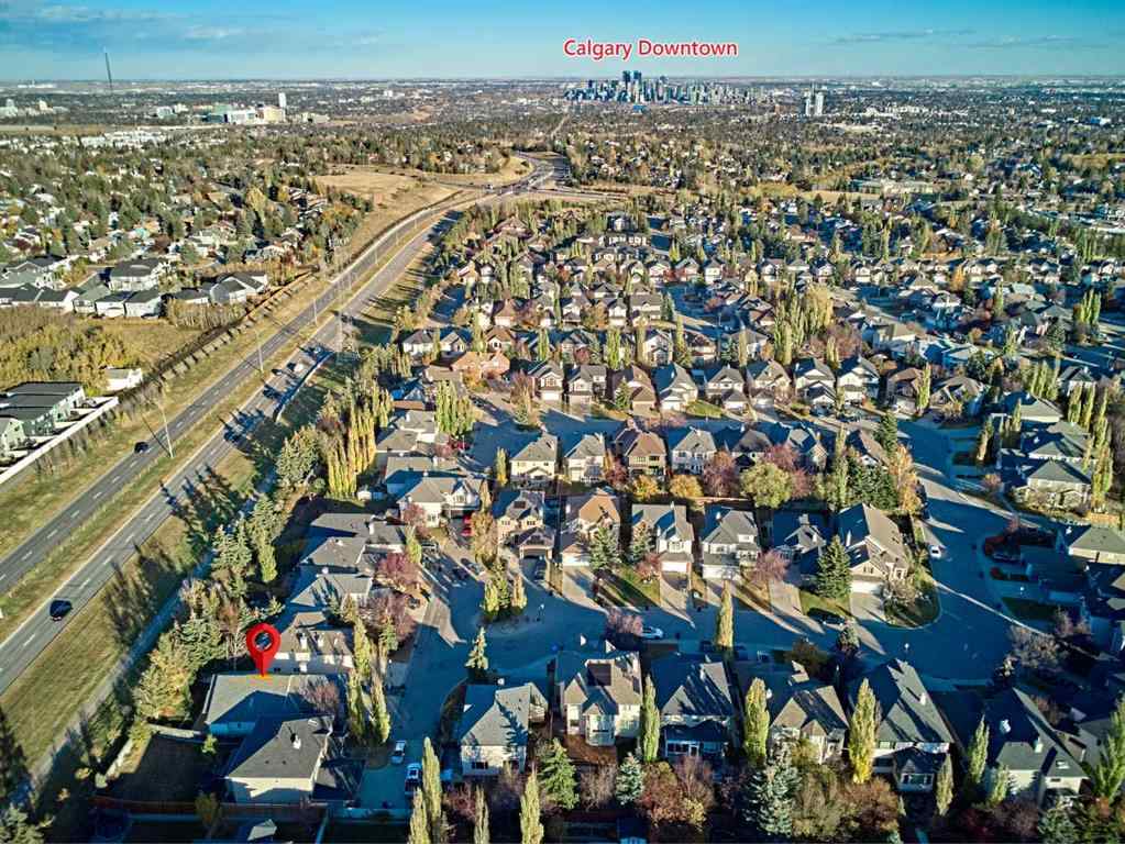 MLS® A2266137 - 250 Strathridge Place SW in Strathcona Park Calgary, Residential