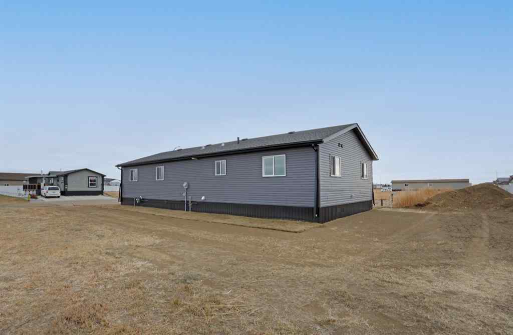 MLS&reg; # A2266150 - 323 20 Street E in Meadowbrook Brooks, Residential Open Houses