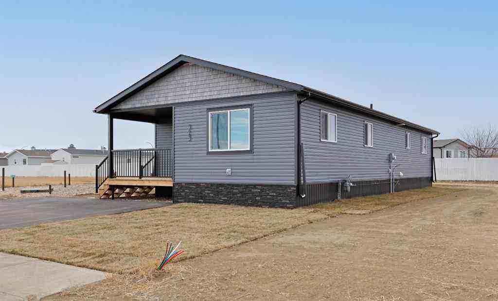 MLS&reg; # A2266150 - 323 20 Street E in Meadowbrook Brooks, Residential Open Houses