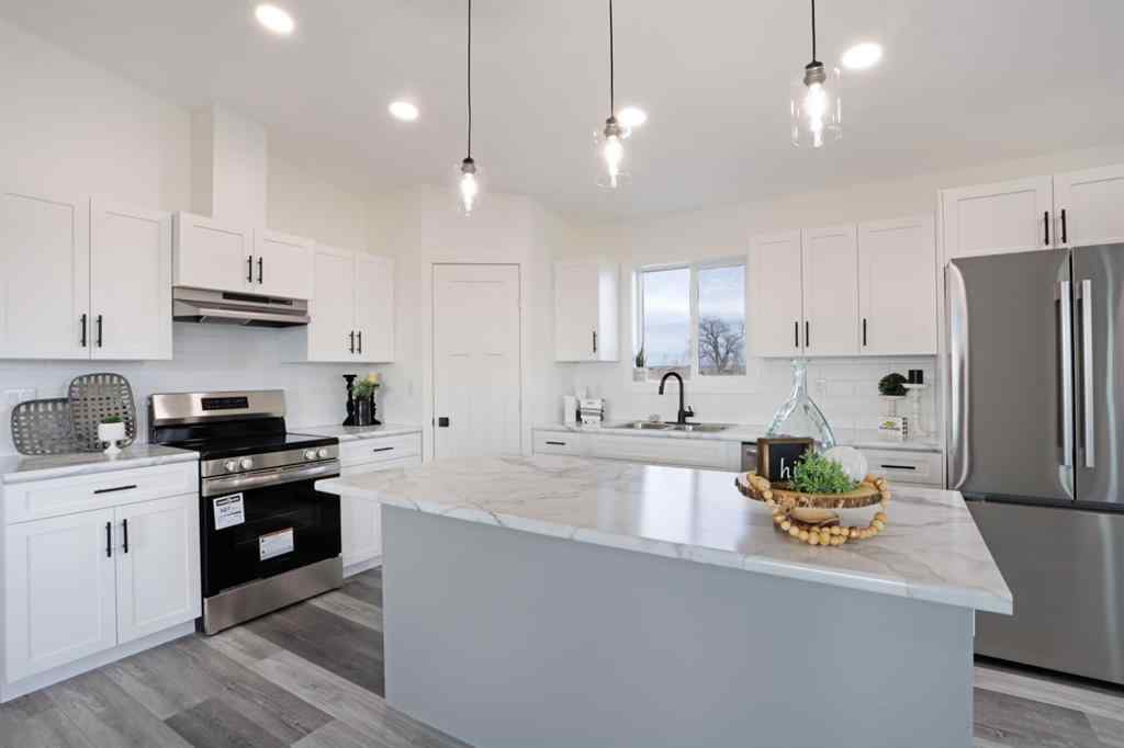 MLS&reg; # A2266150 - 323 20 Street E in Meadowbrook Brooks, Residential Open Houses