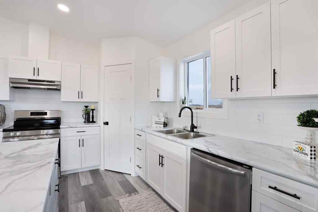 MLS&reg; # A2266150 - 323 20 Street E in Meadowbrook Brooks, Residential Open Houses