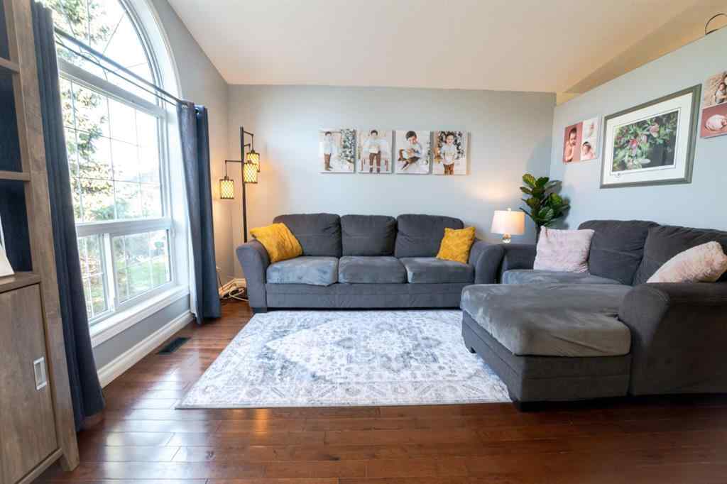 MLS® A2266152 - 8825 104 Avenue  in Ivy Lake Estates Grande Prairie, Residential