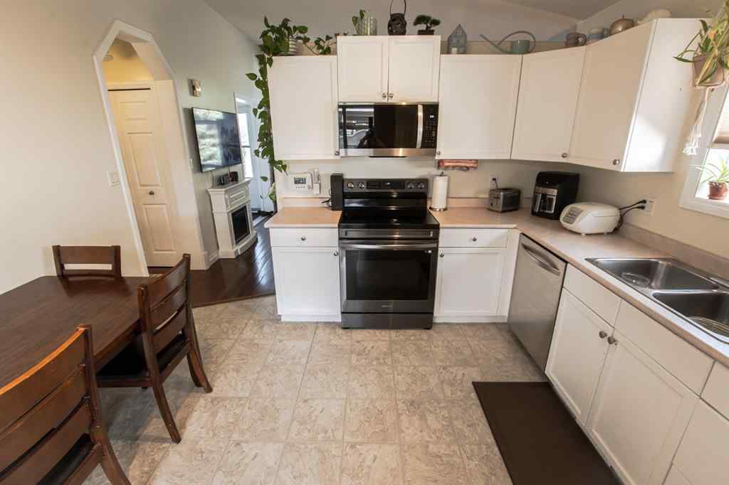 MLS® A2266152 - 8825 104 Avenue  in Ivy Lake Estates Grande Prairie, Residential