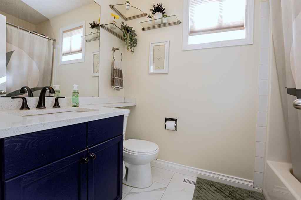 MLS® A2266152 - 8825 104 Avenue  in Ivy Lake Estates Grande Prairie, Residential