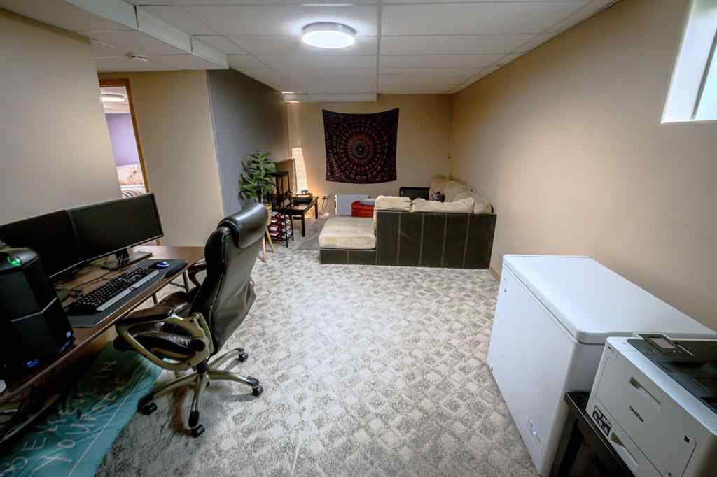 MLS® A2266152 - 8825 104 Avenue  in Ivy Lake Estates Grande Prairie, Residential