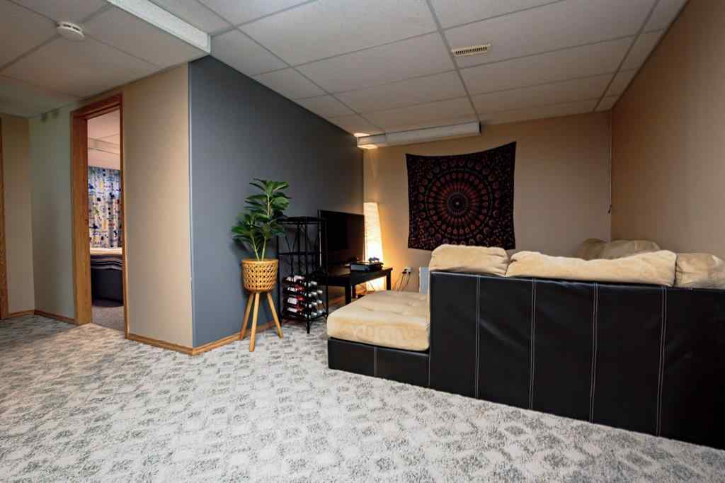 MLS® A2266152 - 8825 104 Avenue  in Ivy Lake Estates Grande Prairie, Residential