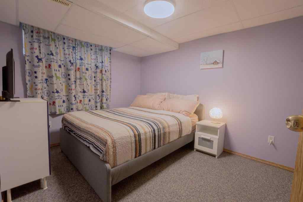 MLS® A2266152 - 8825 104 Avenue  in Ivy Lake Estates Grande Prairie, Residential