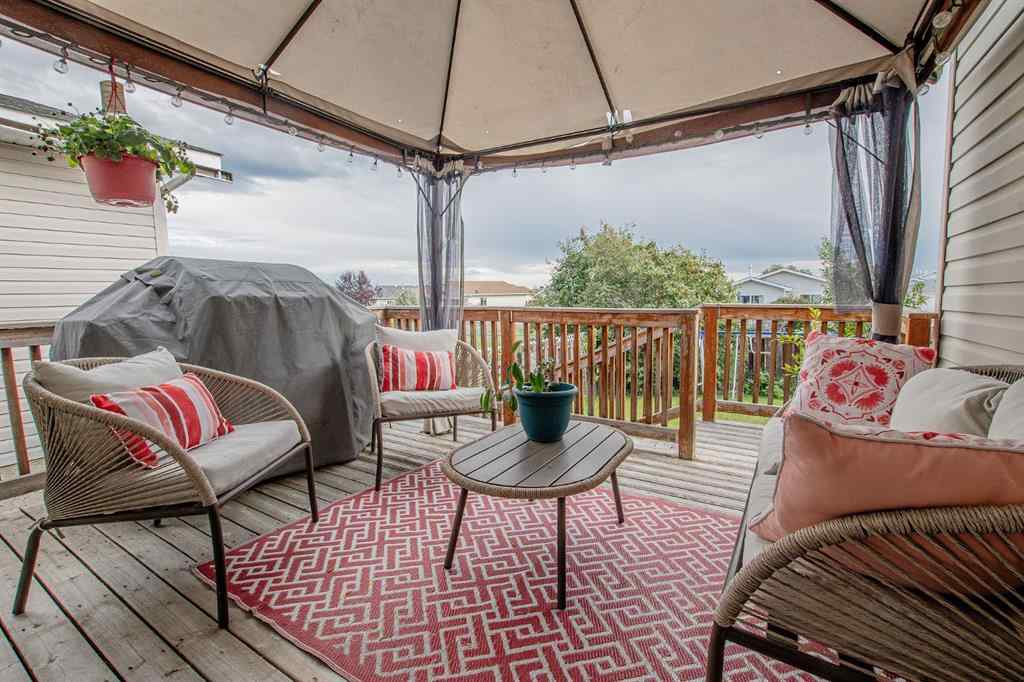 MLS® A2266152 - 8825 104 Avenue  in Ivy Lake Estates Grande Prairie, Residential