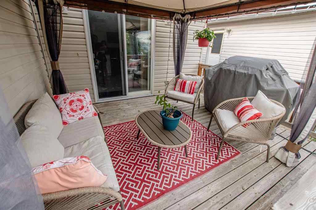 MLS® A2266152 - 8825 104 Avenue  in Ivy Lake Estates Grande Prairie, Residential