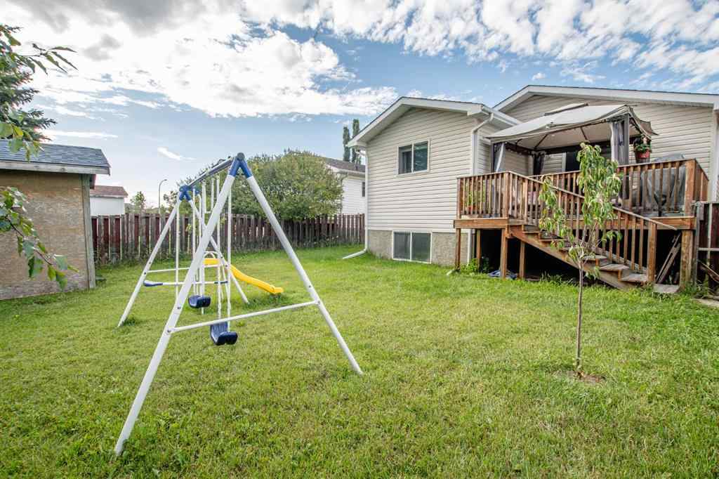 MLS® A2266152 - 8825 104 Avenue  in Ivy Lake Estates Grande Prairie, Residential
