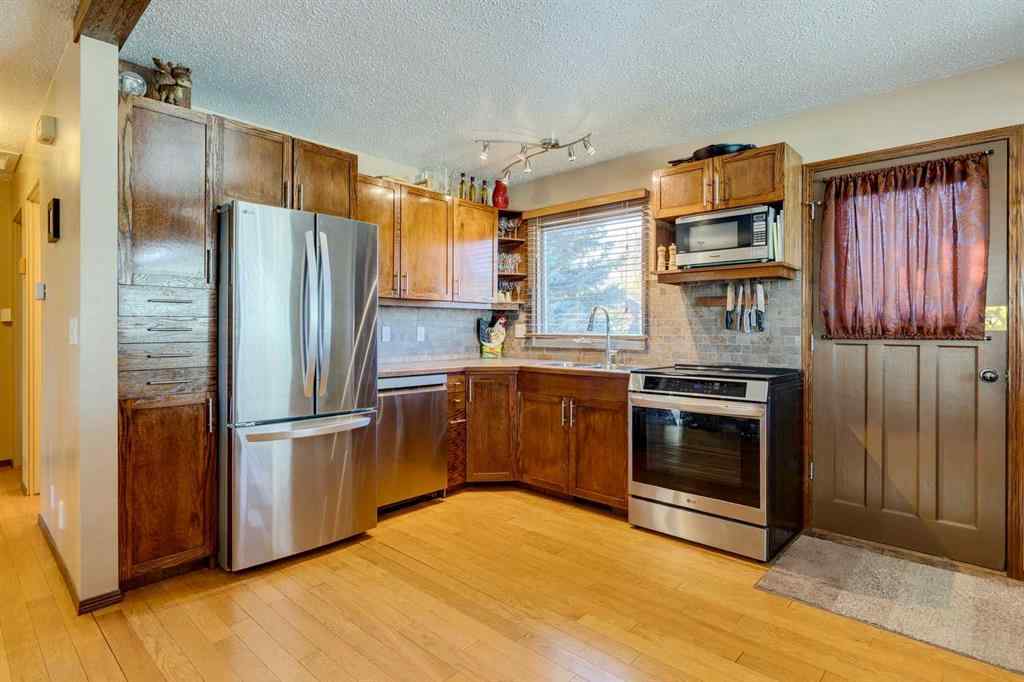 MLS® A2266156 - 150 Midcrest Crescent SE in Midnapore Calgary, Residential