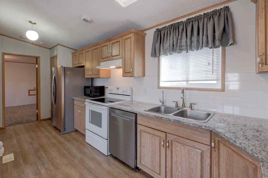 MLS® A2266163 - 818 Briarwood Road  in Brentwood_Strathmore Strathmore, Residential