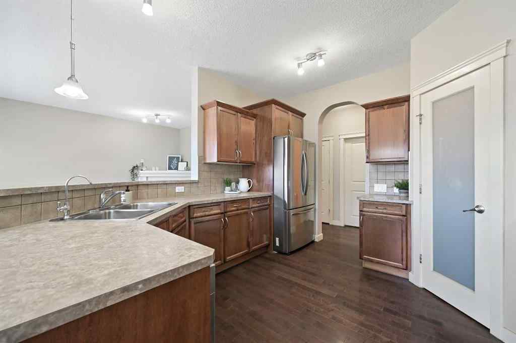 MLS® A2266166 - 229 Bridlerange Place SW in Bridlewood Calgary, Residential