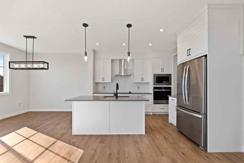 MLS® A2266211 - 496 Lewisburg Place NE in Lewisburg Calgary, Residential