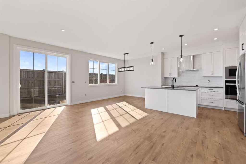 MLS® A2266211 - 496 Lewisburg Place NE in Lewisburg Calgary, Residential