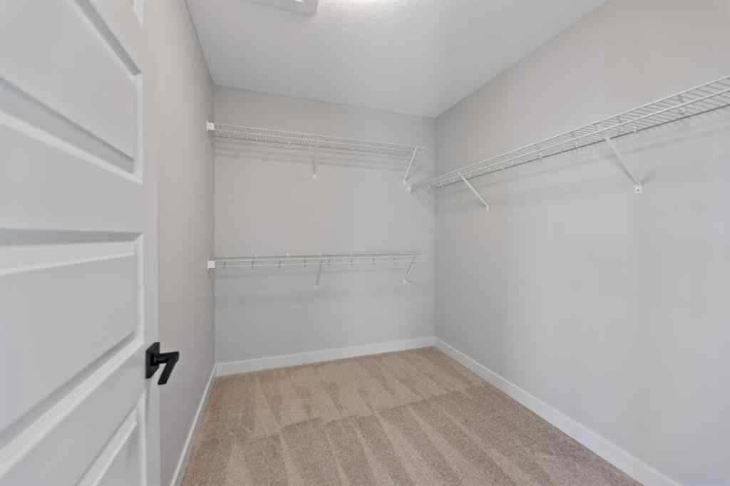 MLS® A2266211 - 496 Lewisburg Place NE in Lewisburg Calgary, Residential