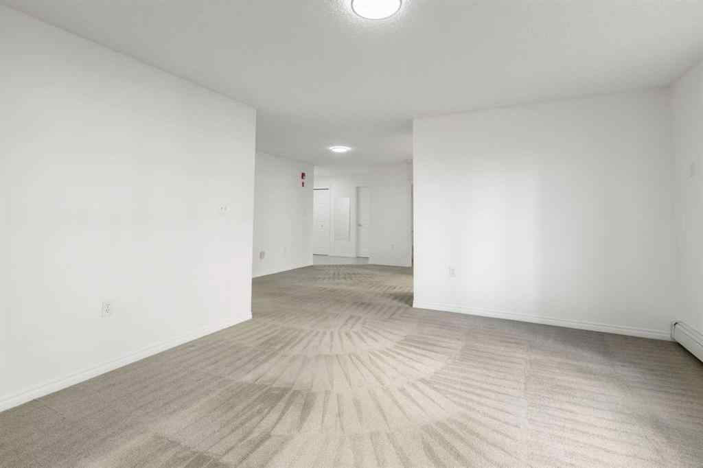 MLS® A2266224 - Unit #114 6800 Hunterview Drive NW in Huntington Hills Calgary, Residential