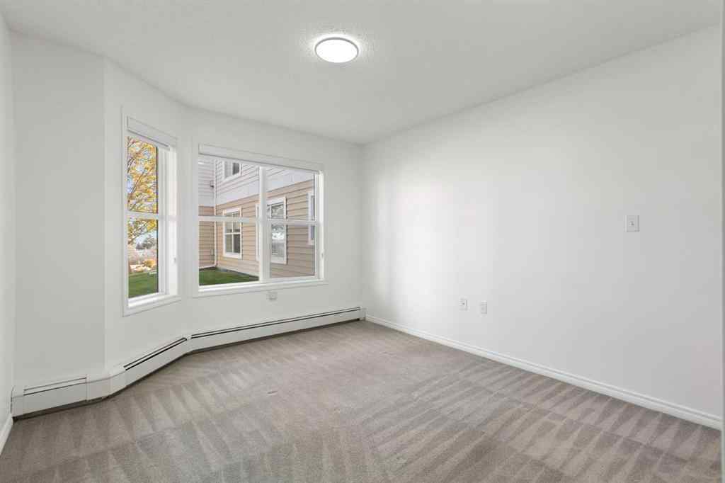 MLS® A2266224 - Unit #114 6800 Hunterview Drive NW in Huntington Hills Calgary, Residential