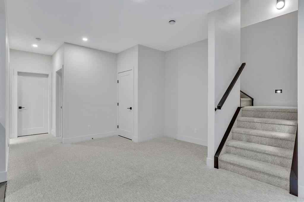 MLS® A2266229 - 330 Normandy Drive SW in Currie Barracks Calgary, Residential