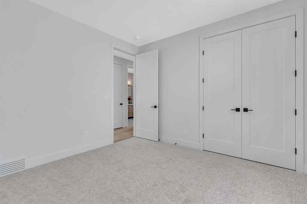 MLS® A2266229 - 330 Normandy Drive SW in Currie Barracks Calgary, Residential