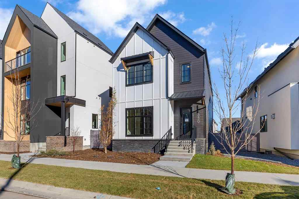 MLS® A2266229 - 330 Normandy Drive SW in Currie Barracks Calgary, Residential