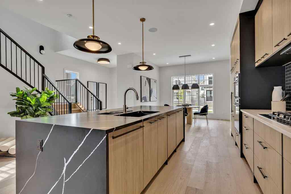 MLS® A2266229 - 330 Normandy Drive SW in Currie Barracks Calgary, Residential