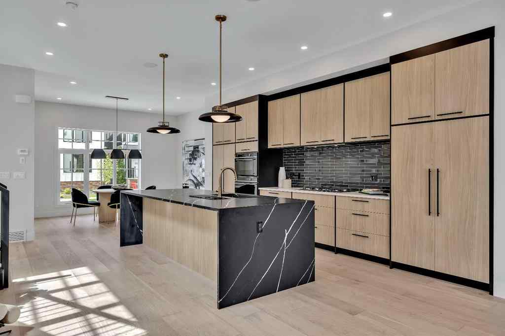 MLS® A2266229 - 330 Normandy Drive SW in Currie Barracks Calgary, Residential