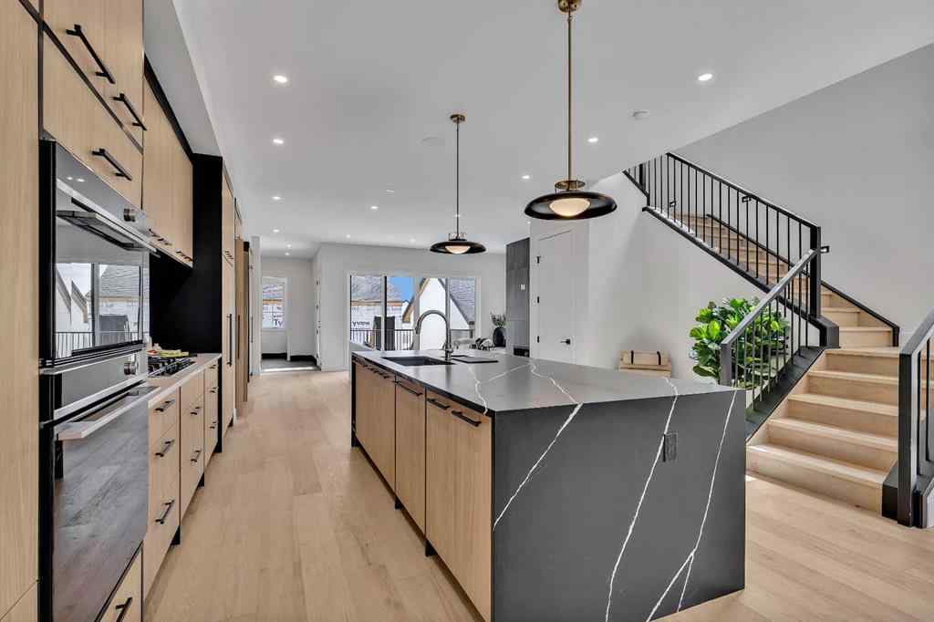 MLS® A2266229 - 330 Normandy Drive SW in Currie Barracks Calgary, Residential