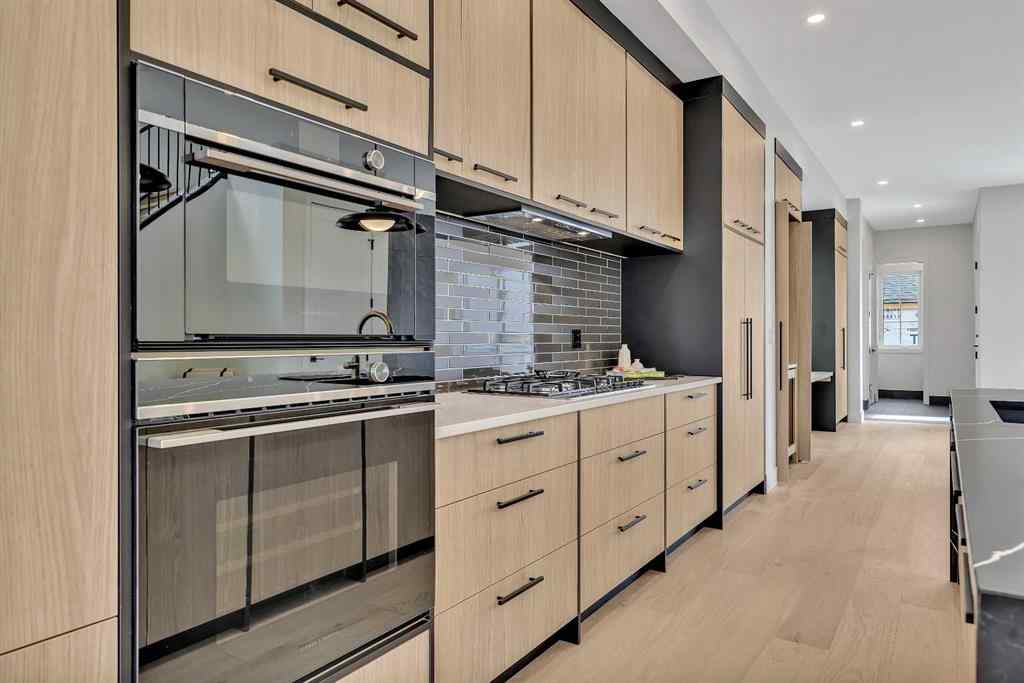 MLS® A2266229 - 330 Normandy Drive SW in Currie Barracks Calgary, Residential