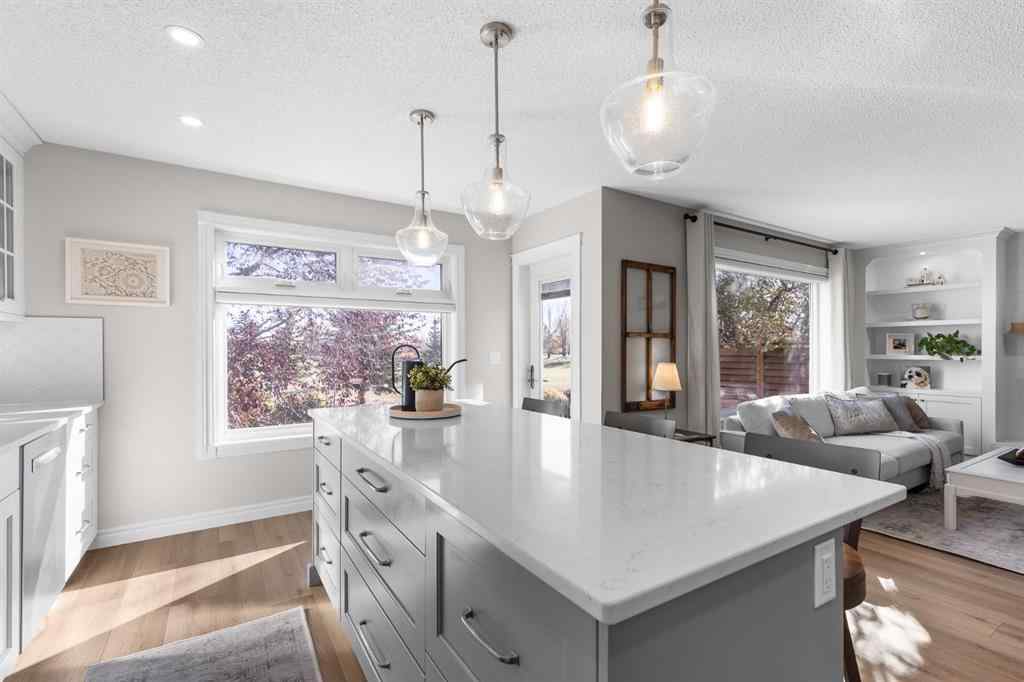 MLS® A2266238 - 720 Woodside Drive NW in Woodside Airdrie, Residential