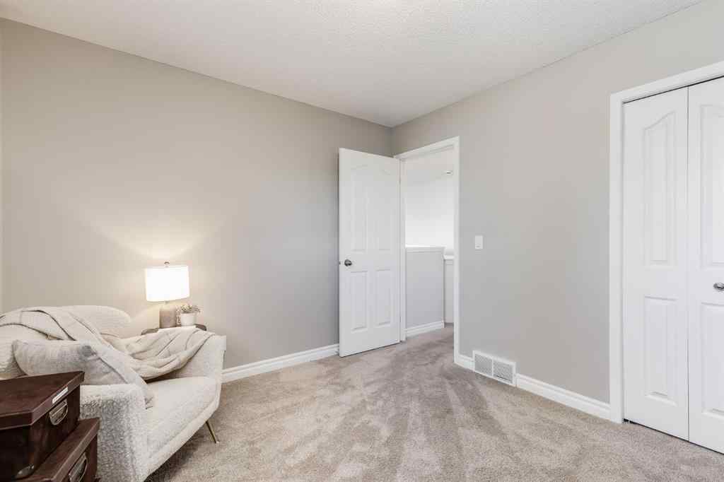 MLS® A2266238 - 720 Woodside Drive NW in Woodside Airdrie, Residential