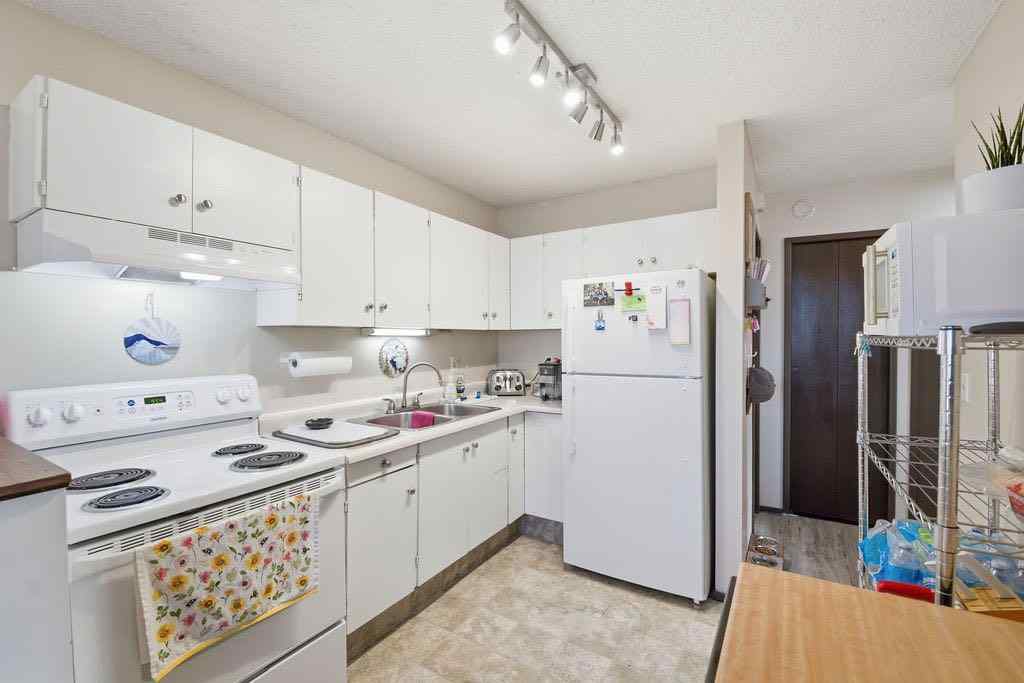 MLS® A2266239 - 121 Powell Street  in East End Cochrane, Multi-Family