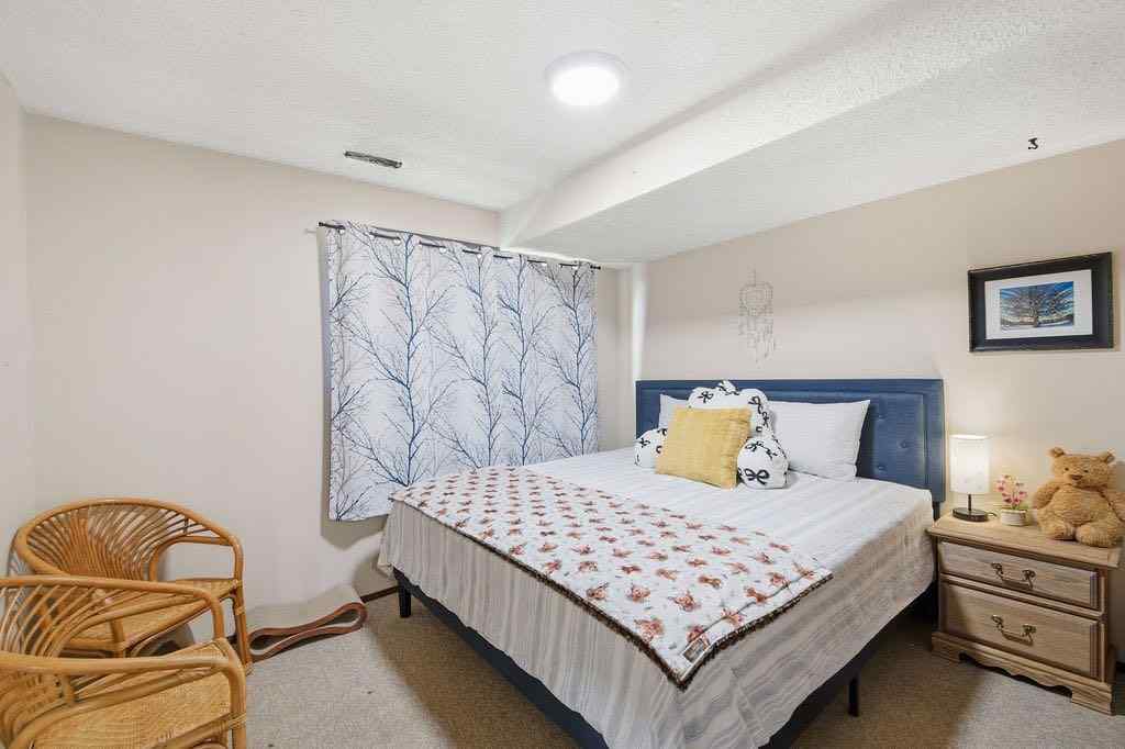 MLS® A2266239 - 121 Powell Street  in East End Cochrane, Multi-Family