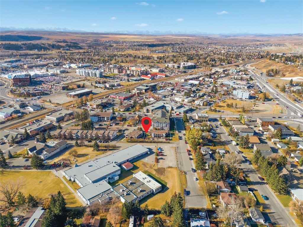 MLS® A2266239 - 121 Powell Street  in East End Cochrane, Multi-Family