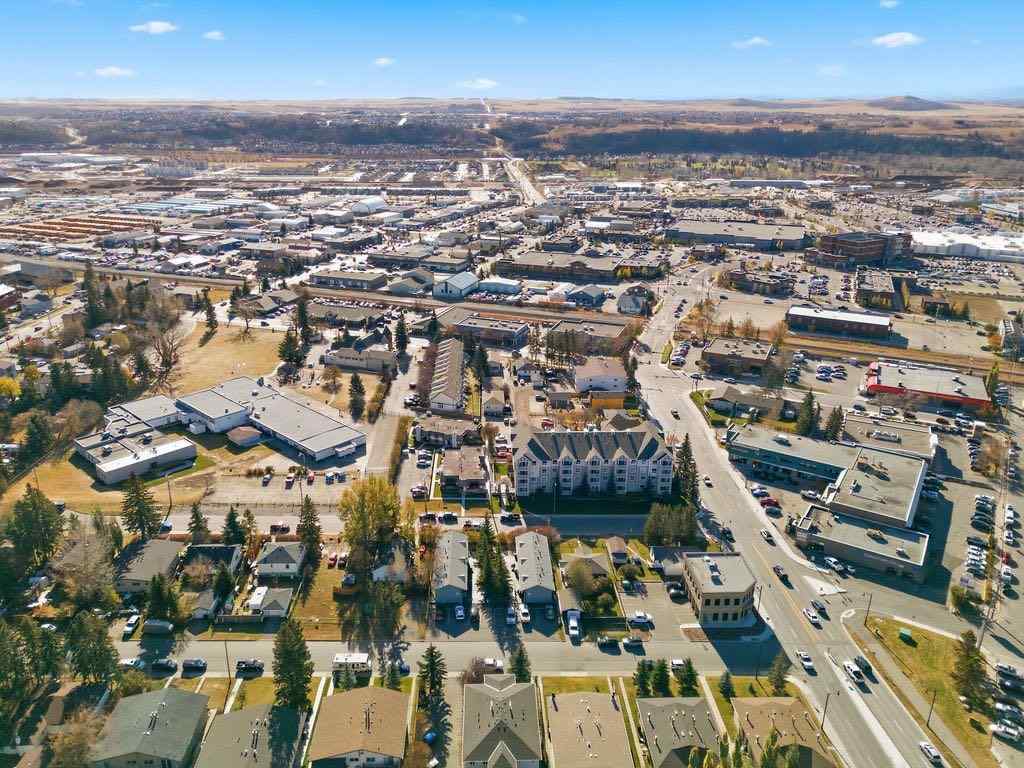 MLS® A2266239 - 121 Powell Street  in East End Cochrane, Multi-Family