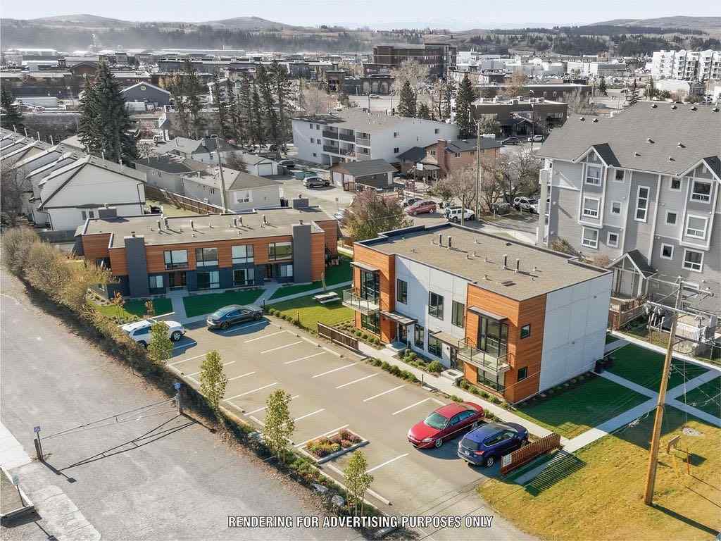 MLS® A2266239 - 121 Powell Street  in East End Cochrane, Multi-Family