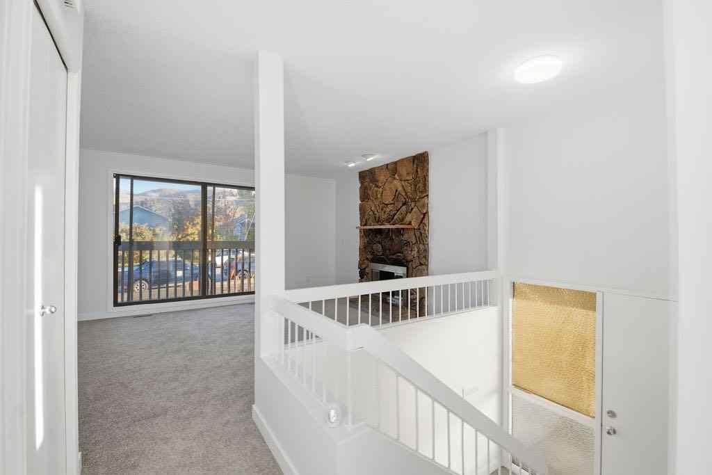 MLS® A2266239 - 121 Powell Street  in East End Cochrane, Multi-Family