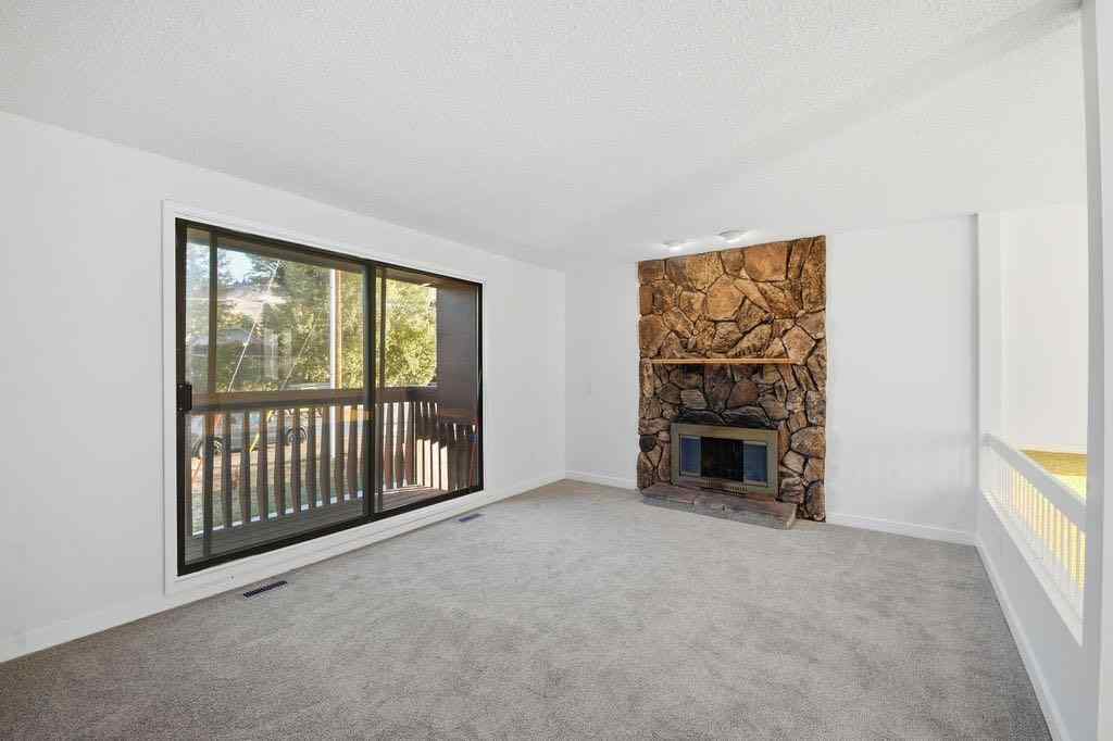 MLS® A2266239 - 121 Powell Street  in East End Cochrane, Multi-Family