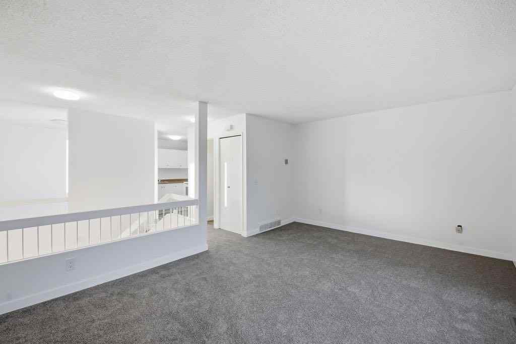 MLS® A2266239 - 121 Powell Street  in East End Cochrane, Multi-Family