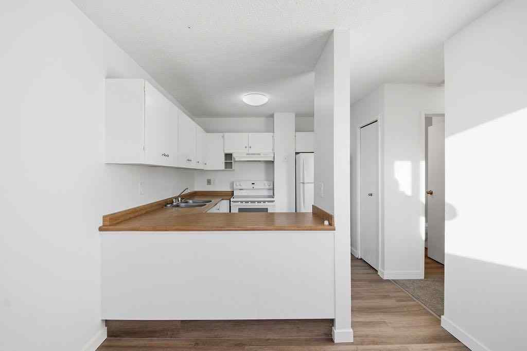 MLS® A2266239 - 121 Powell Street  in East End Cochrane, Multi-Family