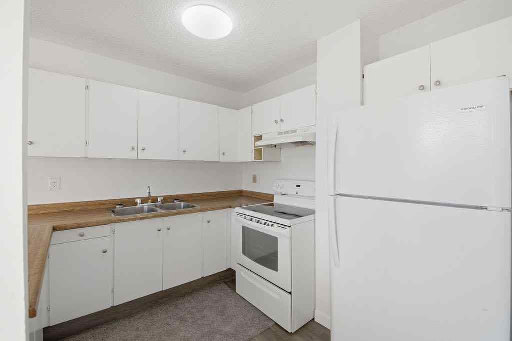 MLS® A2266239 - 121 Powell Street  in East End Cochrane, Multi-Family