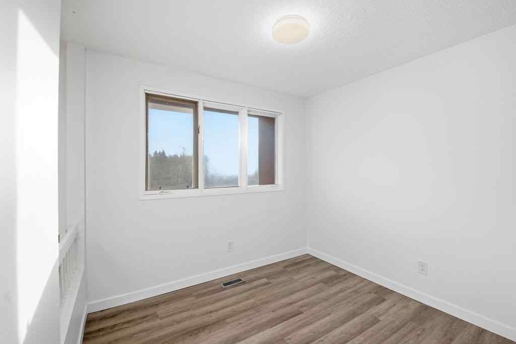 MLS® A2266239 - 121 Powell Street  in East End Cochrane, Multi-Family