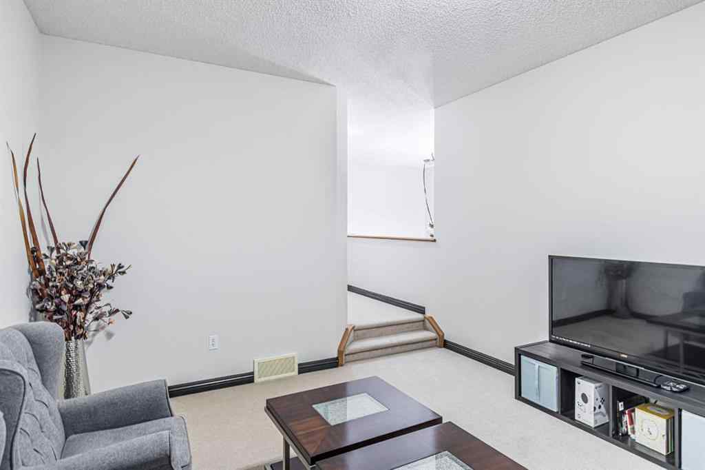 MLS® A2266274 - 1430 Kings Heights Boulevard SE in Kings Heights Airdrie, Residential