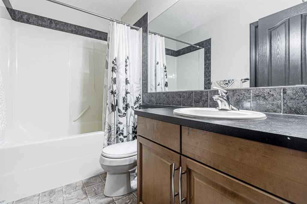 MLS® A2266274 - 1430 Kings Heights Boulevard SE in Kings Heights Airdrie, Residential