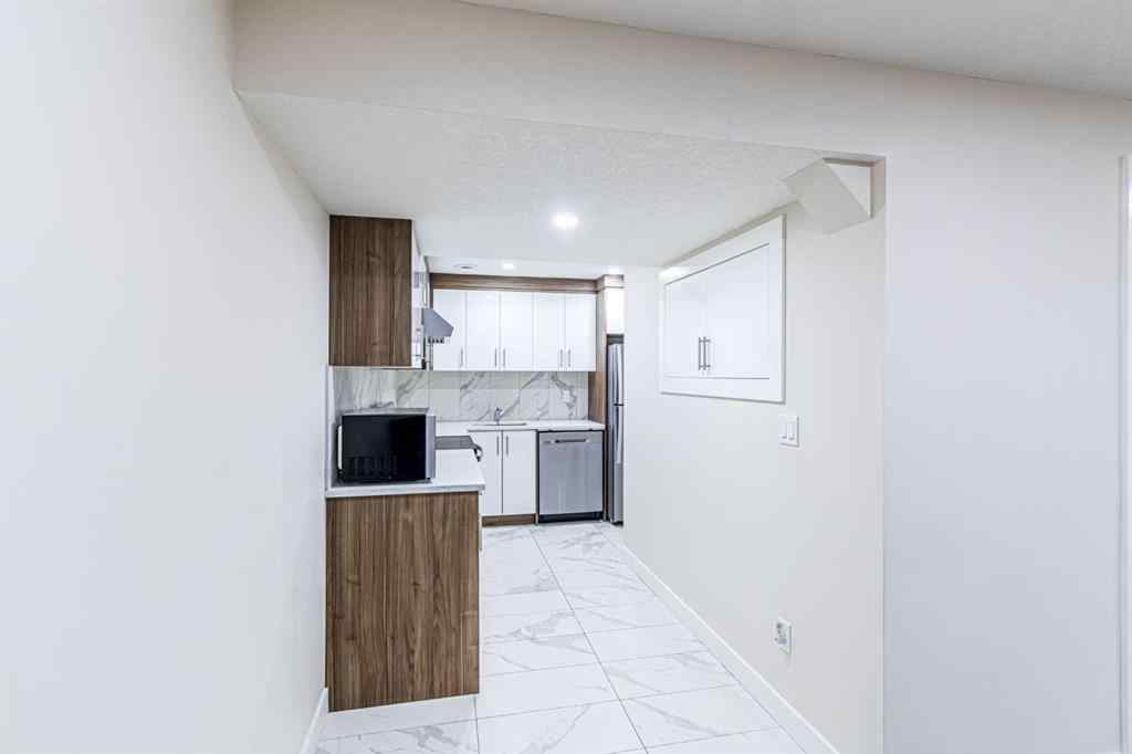 MLS® A2266274 - 1430 Kings Heights Boulevard SE in Kings Heights Airdrie, Residential