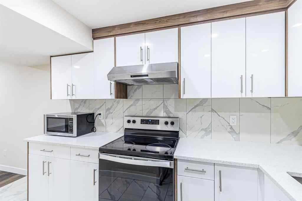 MLS® A2266274 - 1430 Kings Heights Boulevard SE in Kings Heights Airdrie, Residential