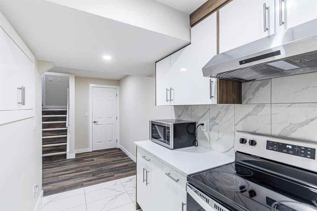 MLS® A2266274 - 1430 Kings Heights Boulevard SE in Kings Heights Airdrie, Residential