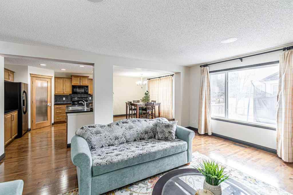 MLS® A2266274 - 1430 Kings Heights Boulevard SE in Kings Heights Airdrie, Residential