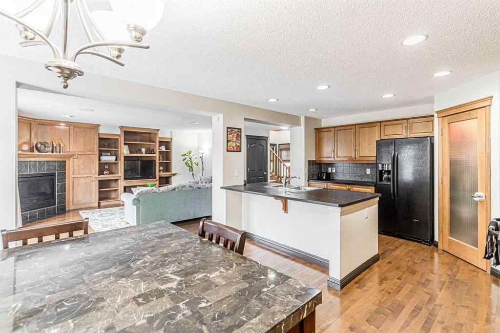 MLS® A2266274 - 1430 Kings Heights Boulevard SE in Kings Heights Airdrie, Residential
